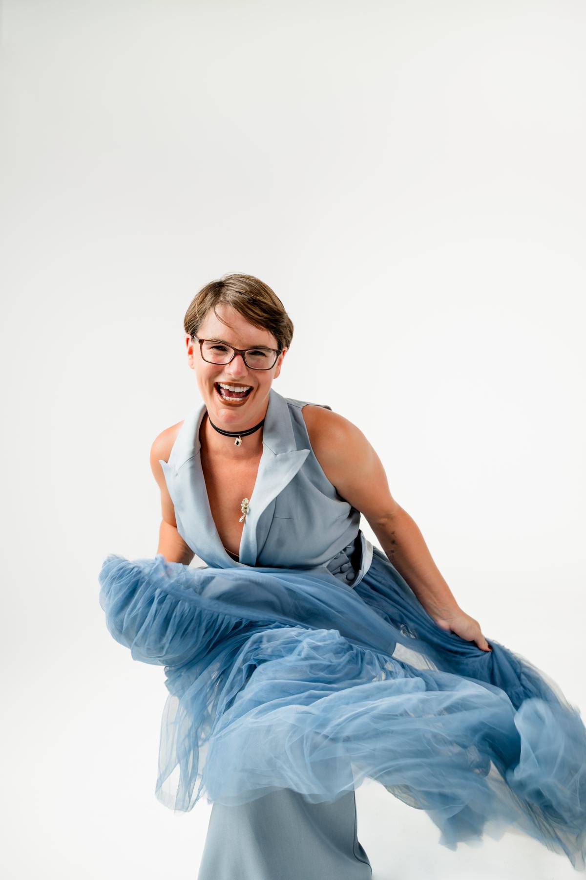 Bonnie Wicks laughing in blue tulle